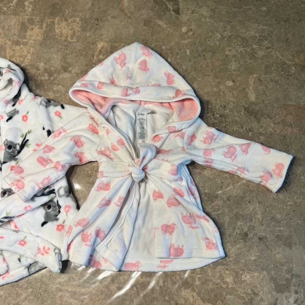 Carter’s Baby girl hooded bath robes size 0-9 months
Like new condition - Picture 3 of 8
